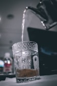 clear drinking glass with water
