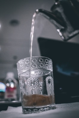 clear drinking glass with water