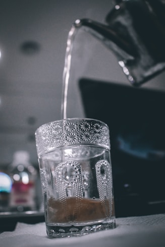 clear drinking glass with water