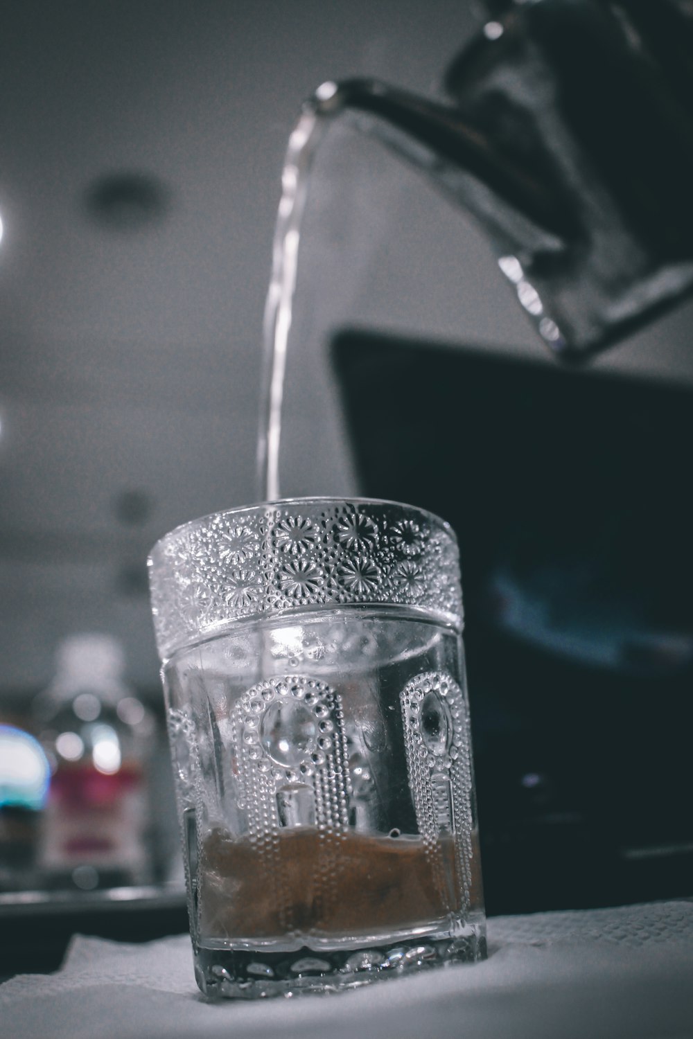 clear drinking glass with water