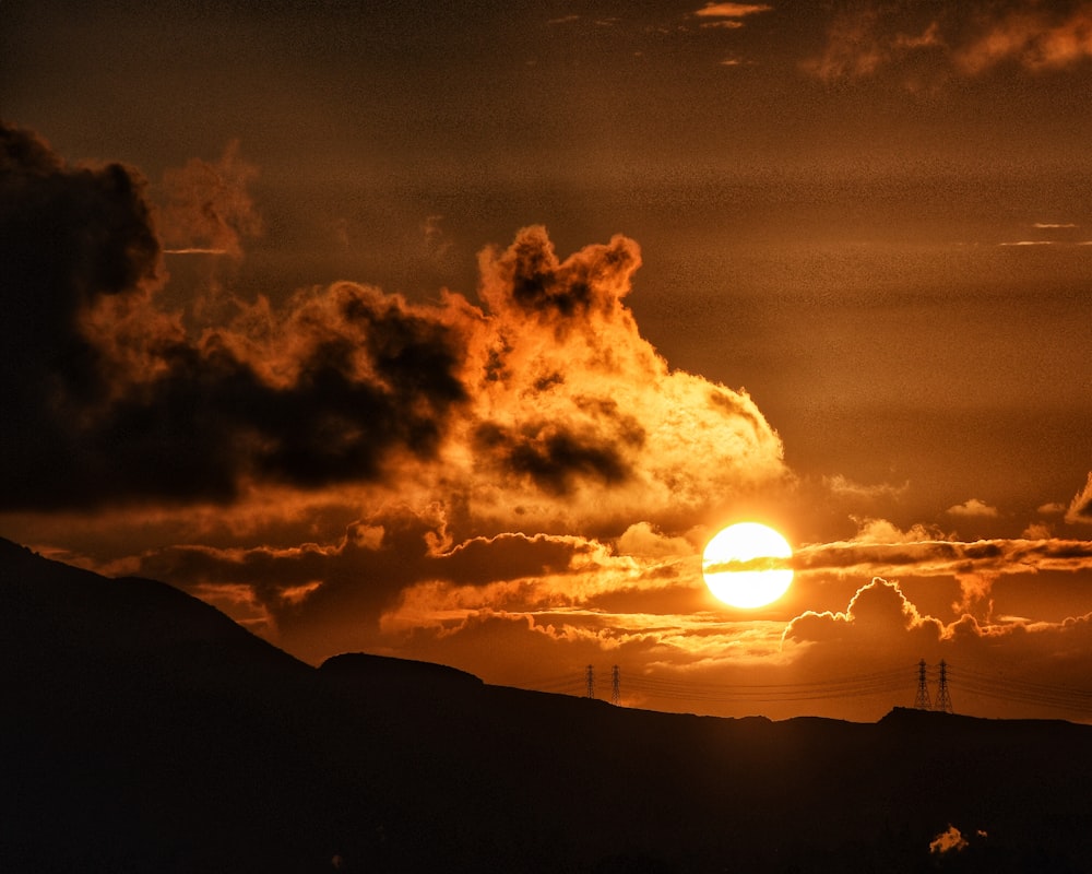 silhouette of mountain during sunset