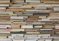 brown wooden book shelf with books