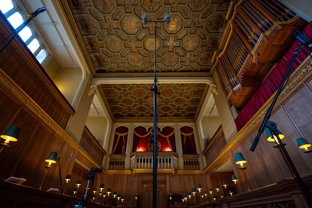 blue and gold ceiling with chandeliers