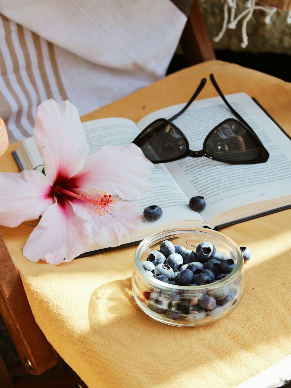 white cherry blossom in clear glass bowl