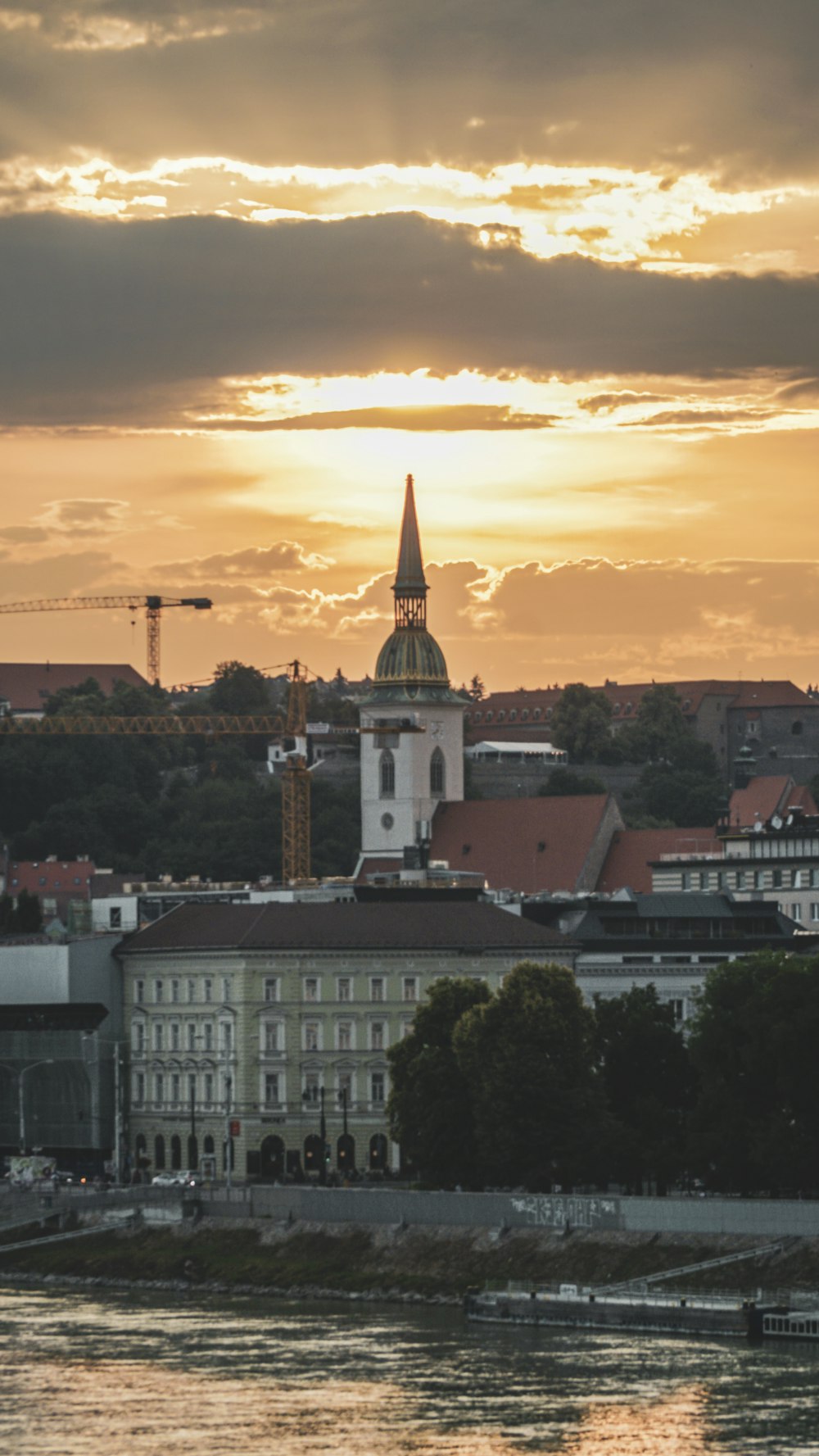 white and brown concrete building during sunset