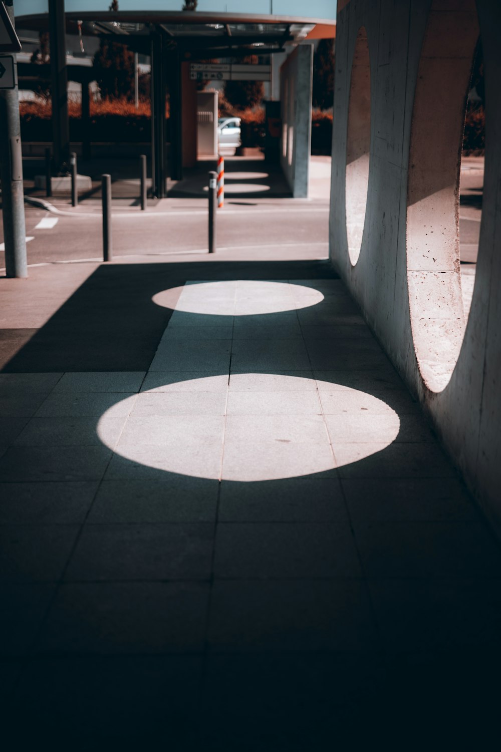 white and black round floor tiles