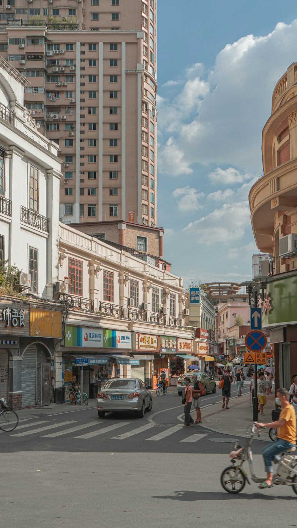 people walking on street near buildings during daytime