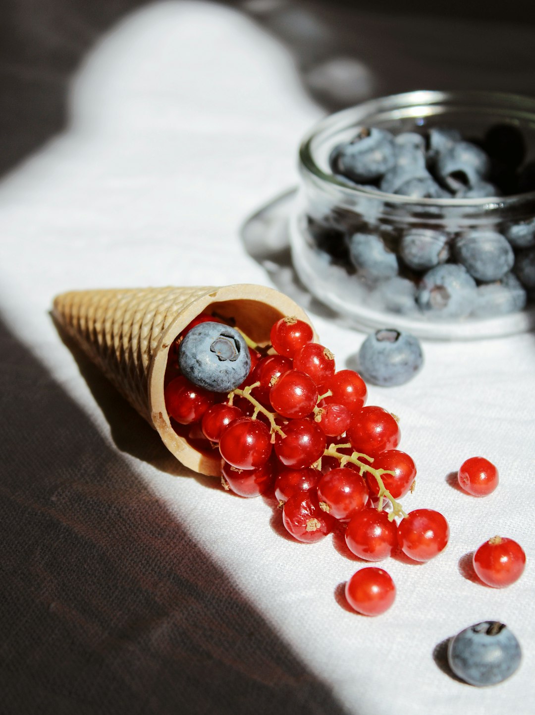 red beads in clear glass jar