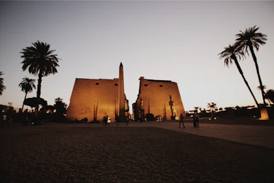 Visitors walking the Luxor temple approach