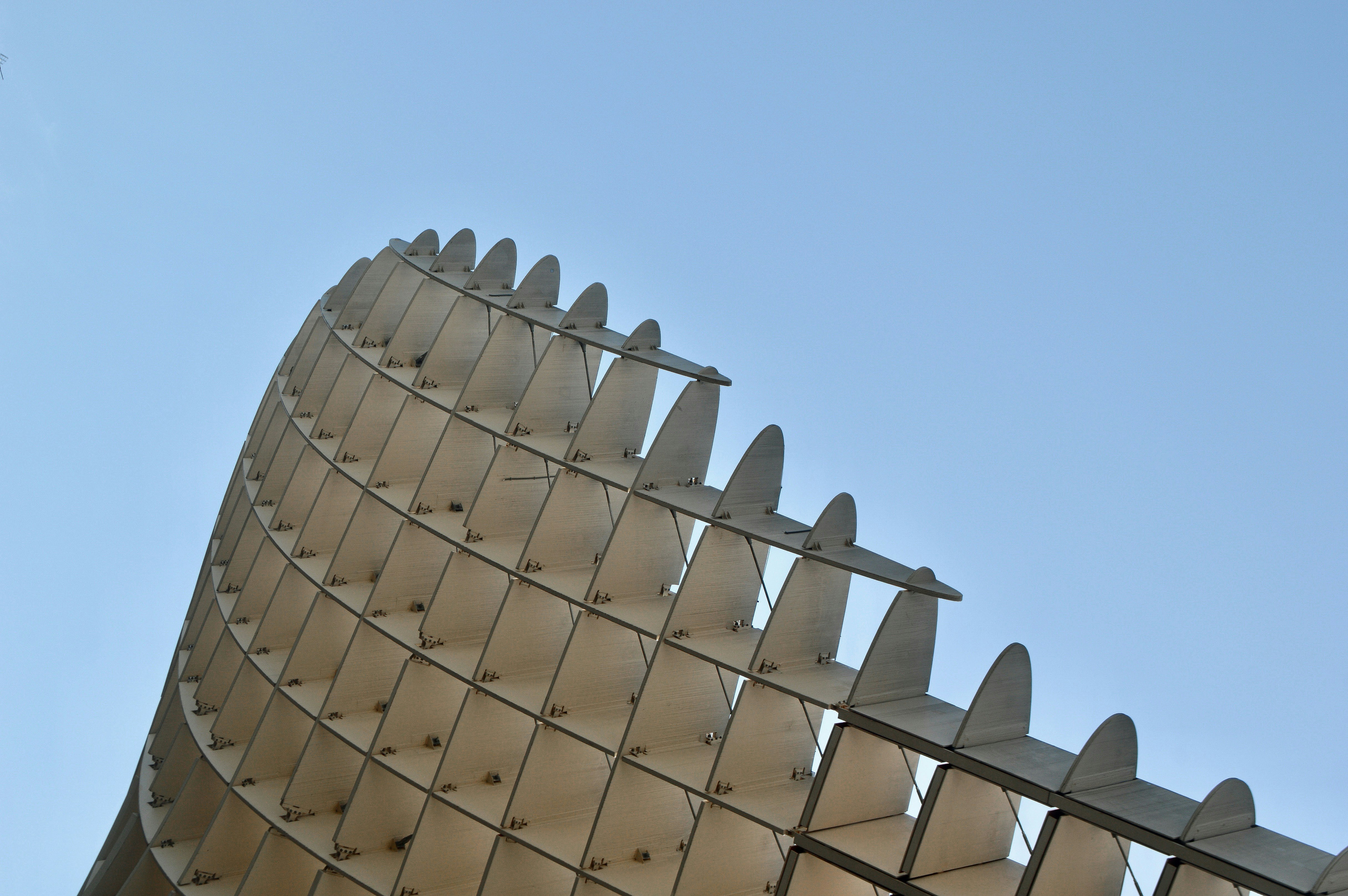 white concrete building under blue sky during daytime