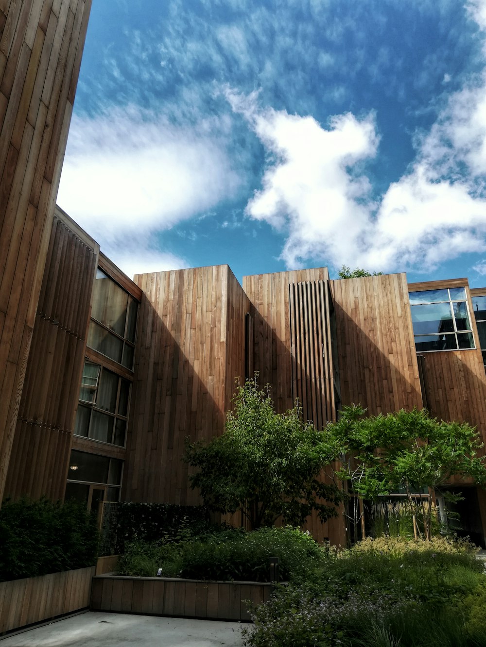 brown wooden building under blue sky during daytime