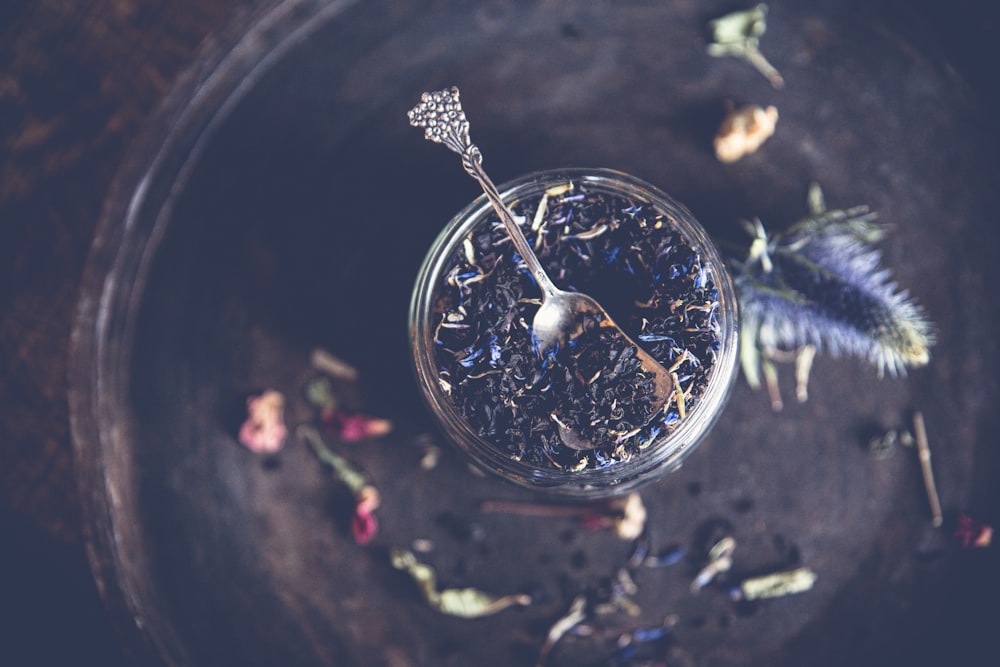 water in clear glass jar