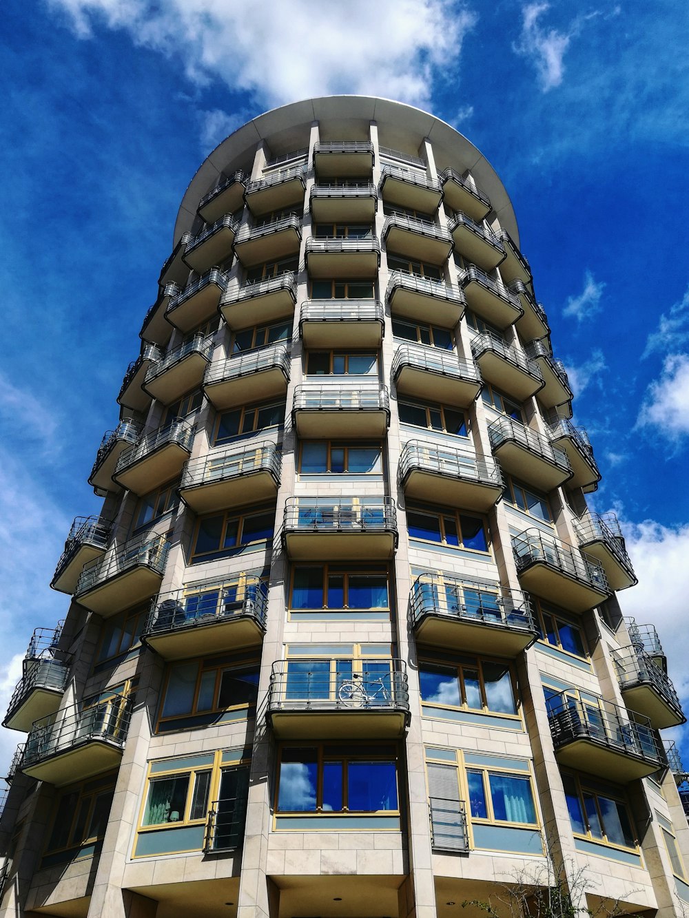 yellow concrete building under blue sky during daytime