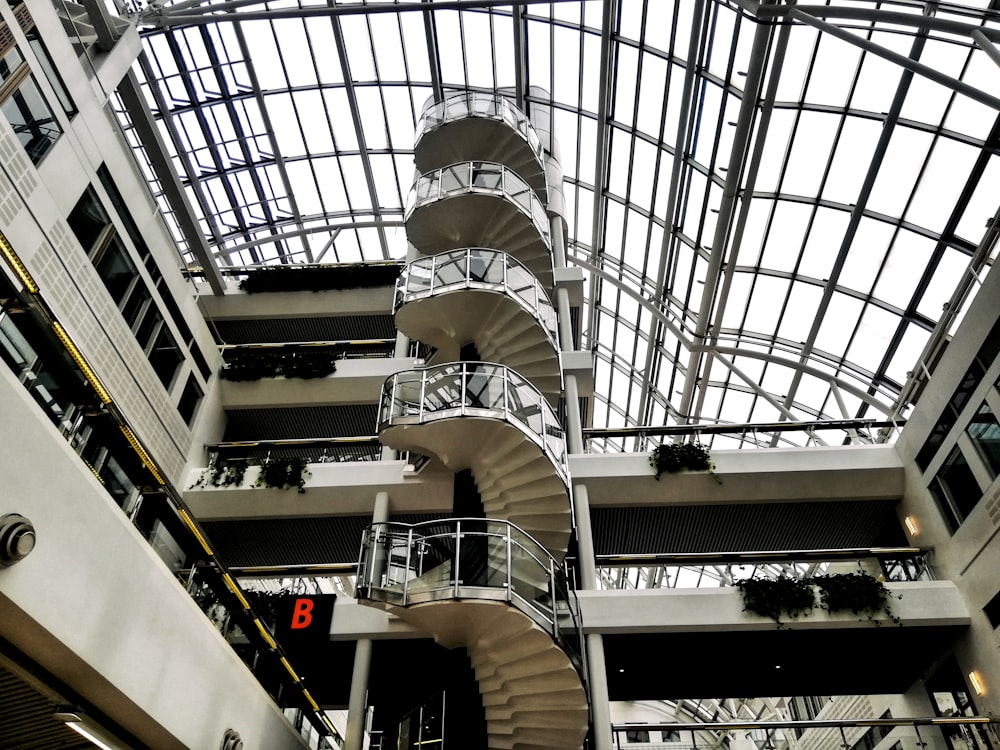 white spiral staircase inside building