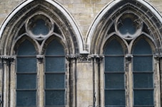a couple of large windows sitting next to each other