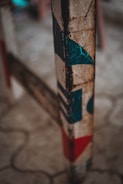 Close-up of distressed paint on an heirloom-inspired wooden stool