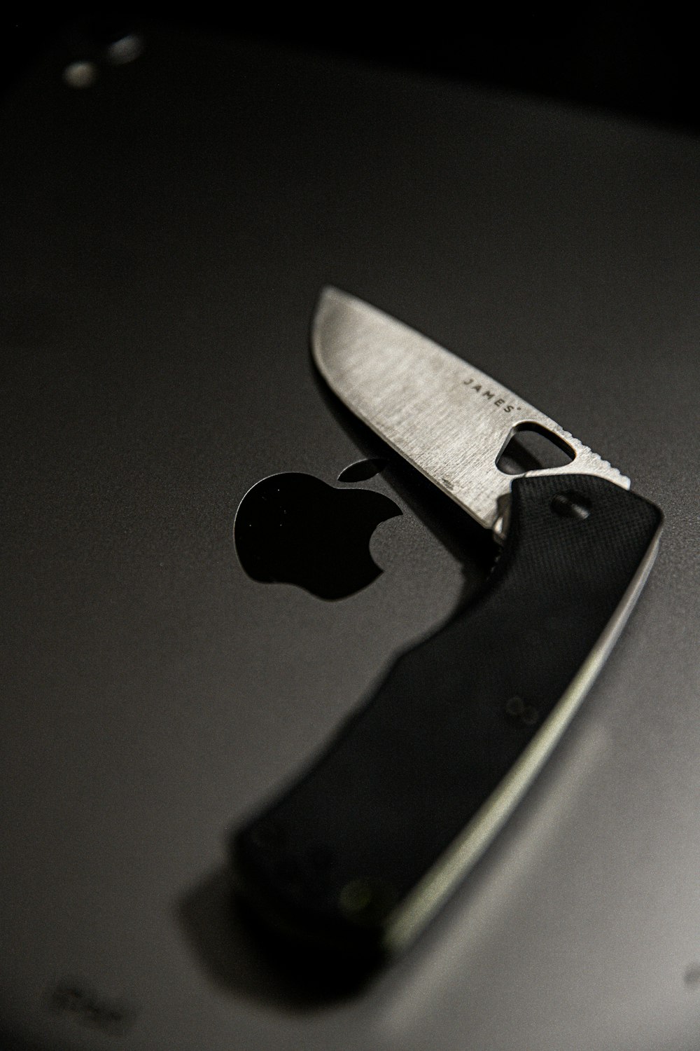 black and silver pocket knife