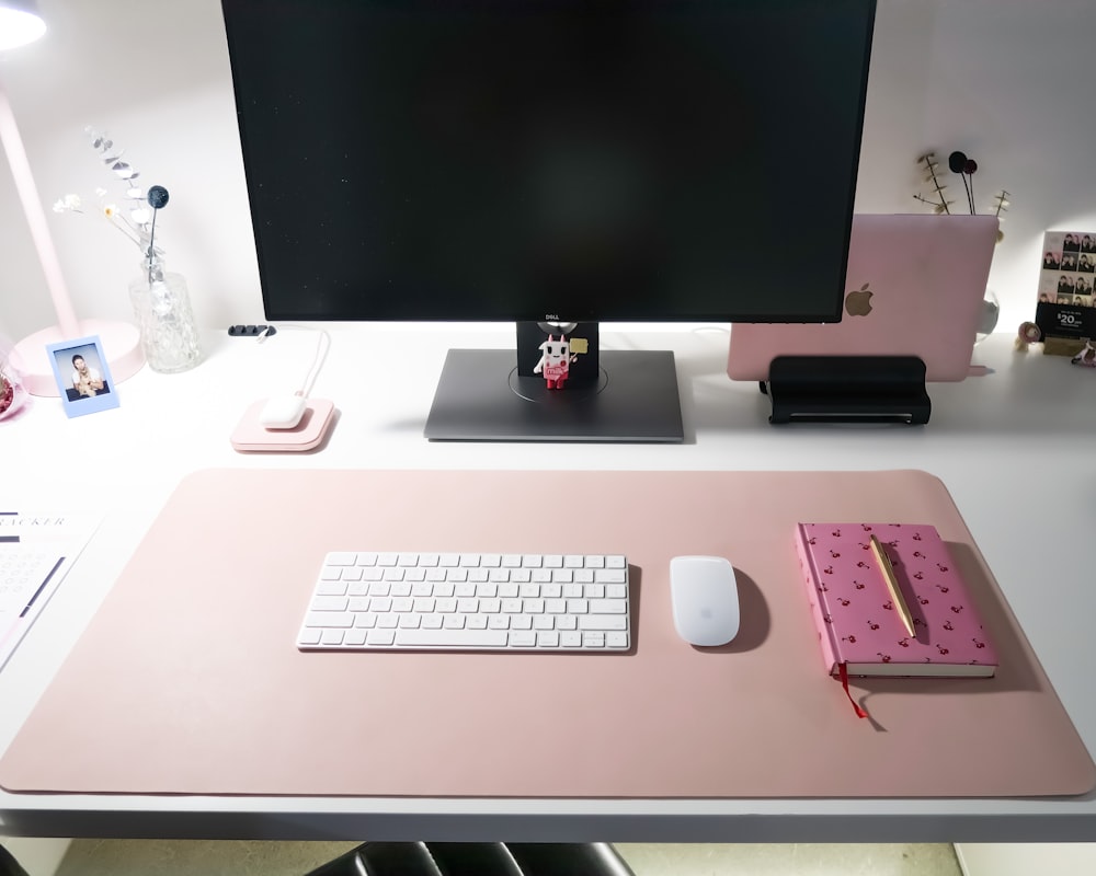 silver imac on white desk