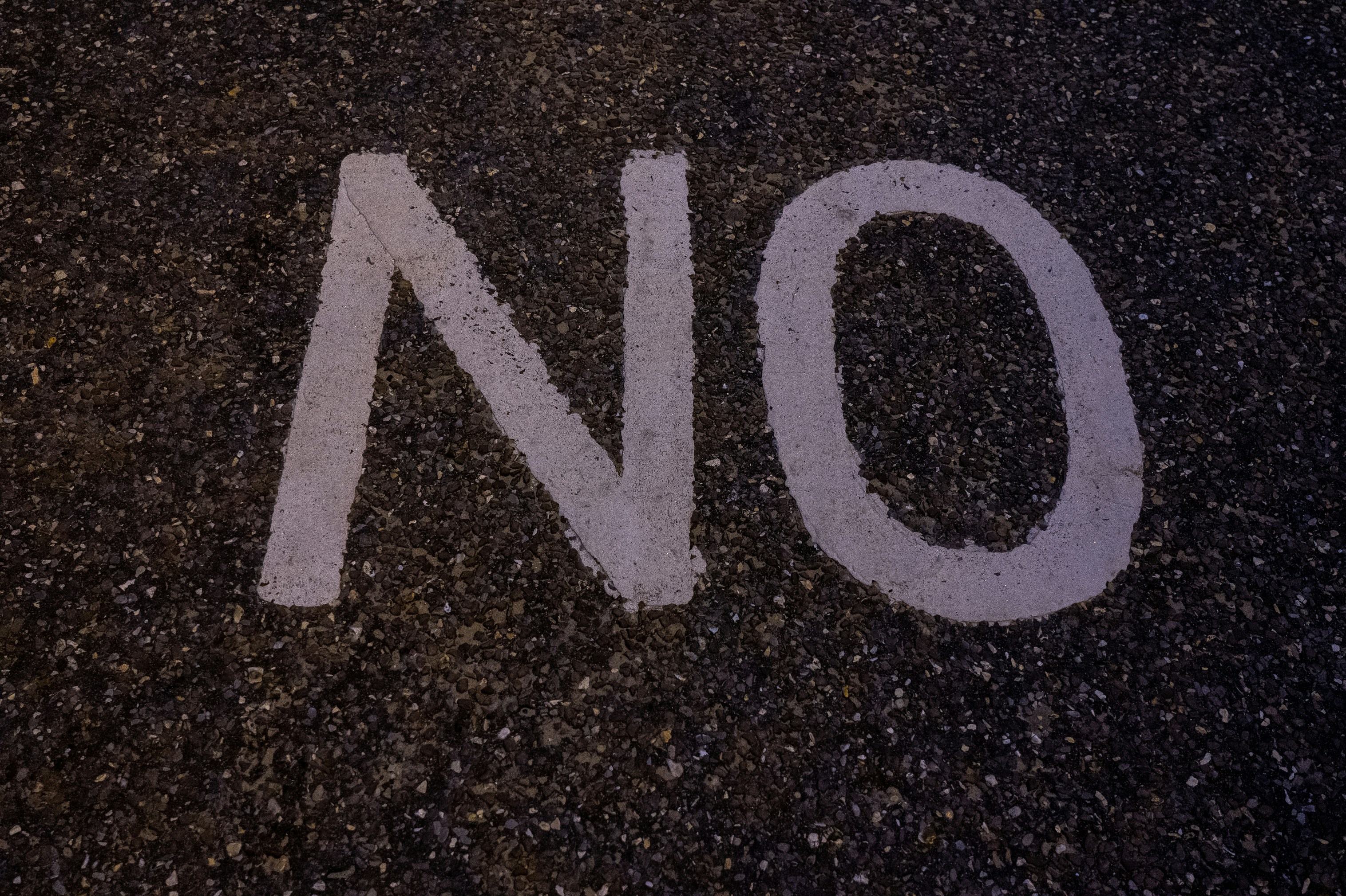 Part of the No Cycling sign on the beach front at Southbourne Beach.