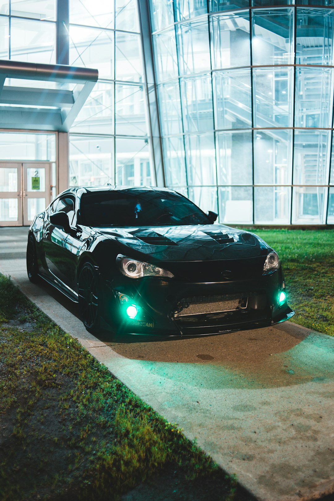 black porsche 911 parked in garage