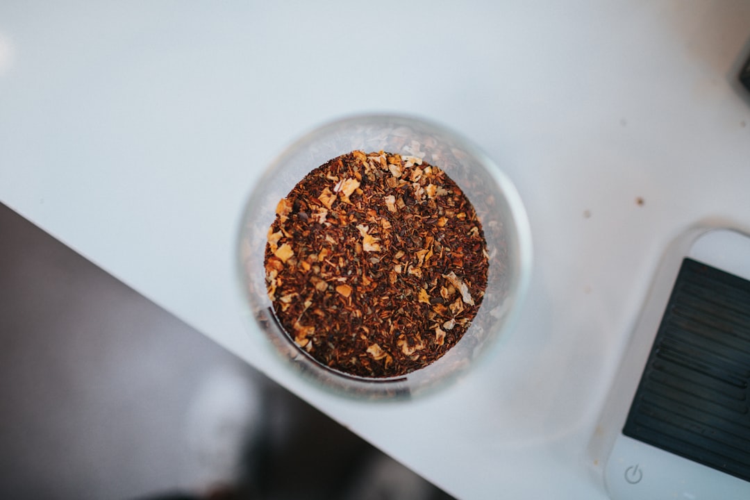 brown food in clear glass bowl