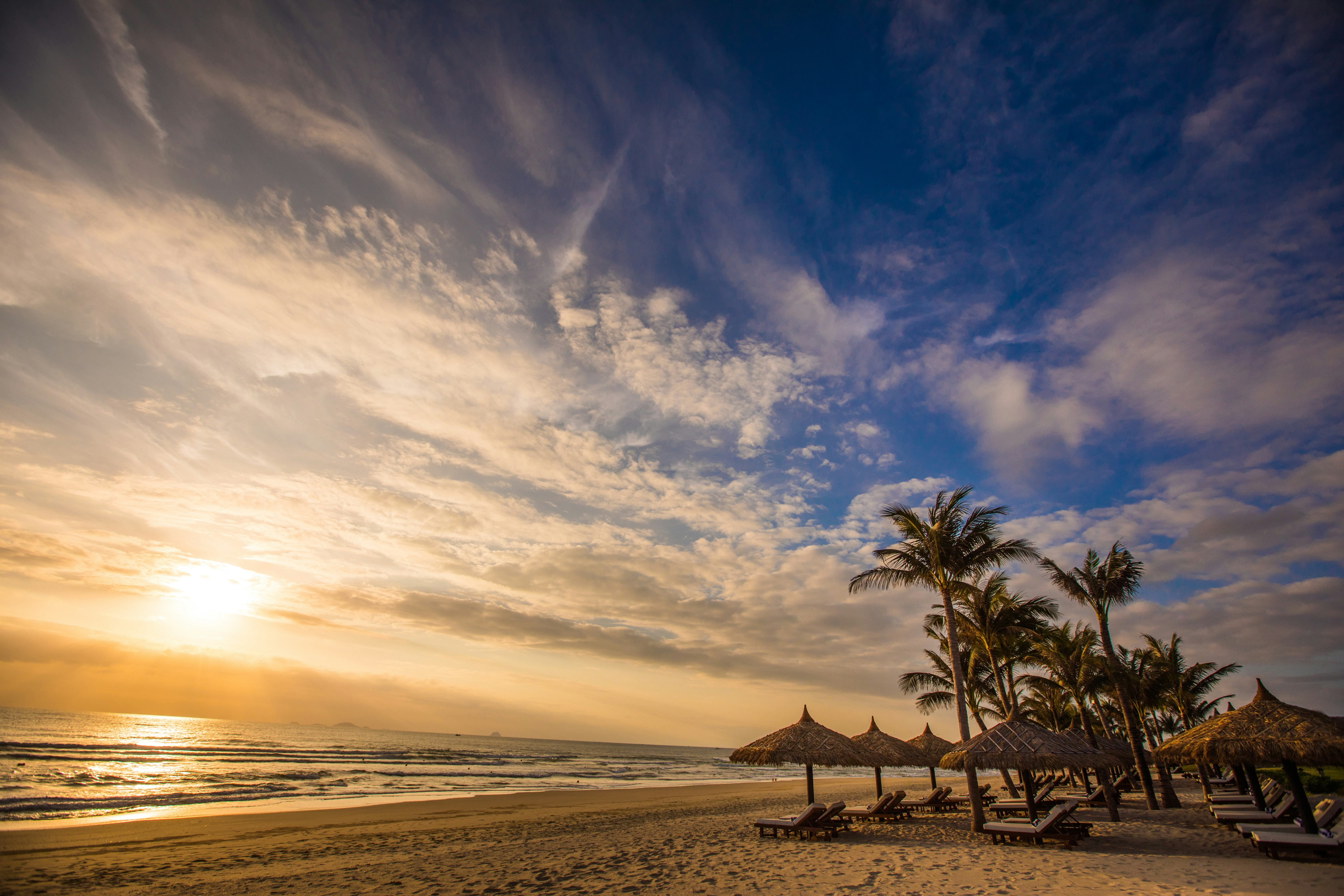 private beach at The Anam resort Cam Ranh in sunrise