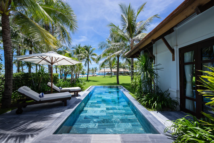 A villa pool amid palms
