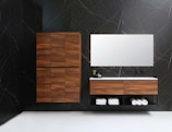 brown wooden cabinet with mirror
