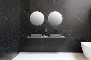 white ceramic sink with faucet
