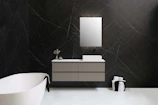 Modern floating bathroom vanity with clean lines and soft lighting.