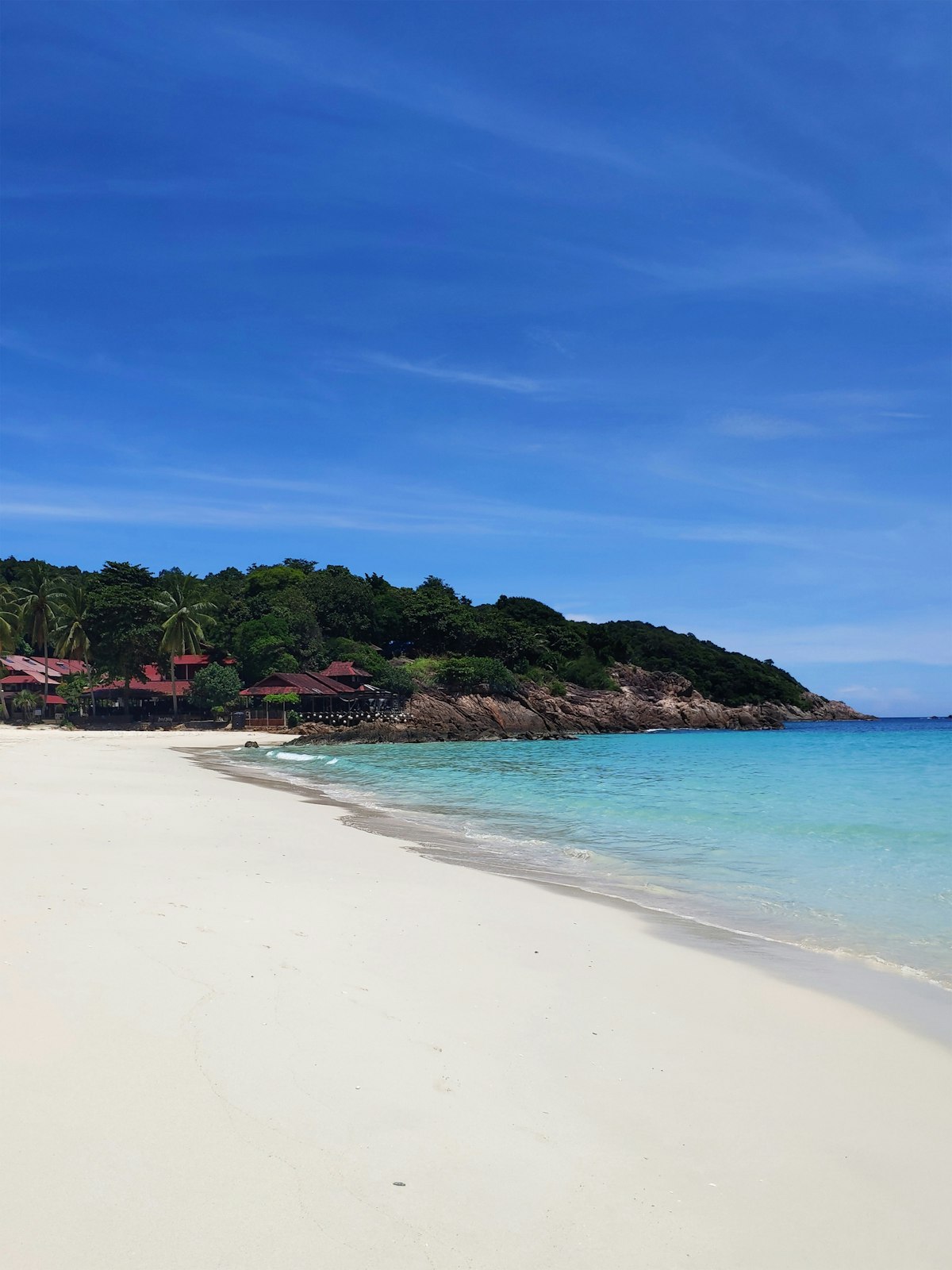 Langkawi March — mangrove waterway with limestone cliffs in Kilim Geopark