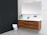 Bright, modern bathroom with a floating vanity and matte black fixtures.