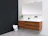Bright, modern bathroom with a floating vanity and matte black fixtures.