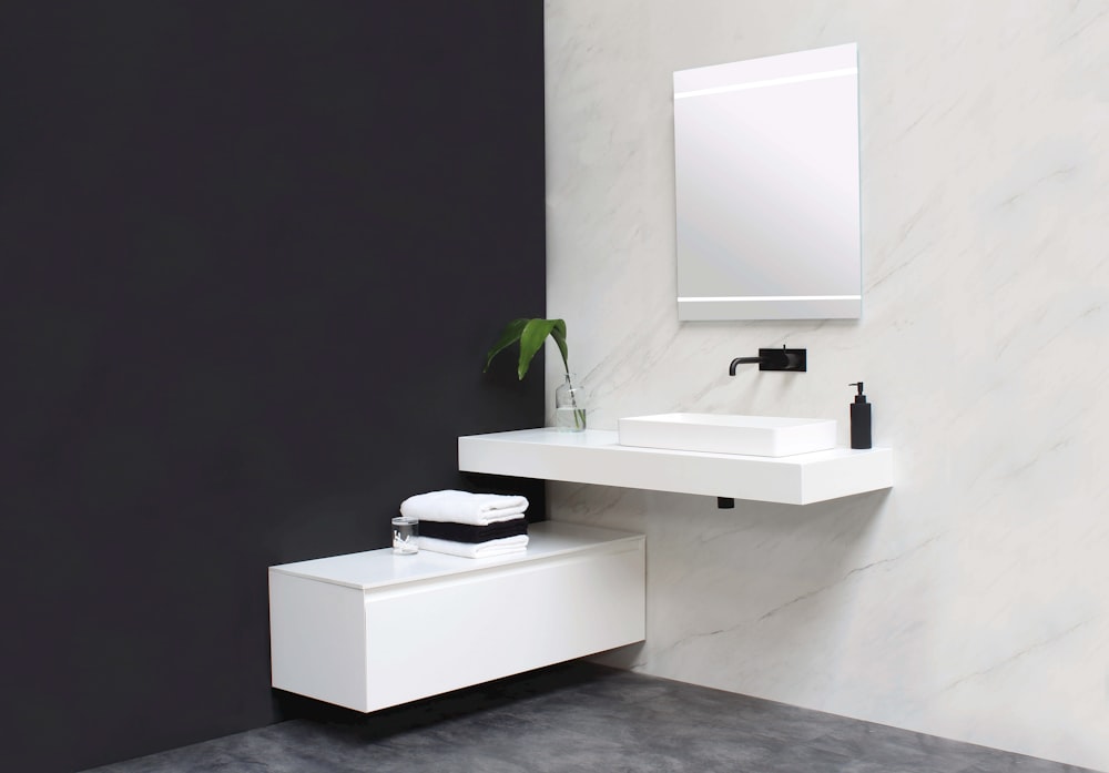 white ceramic sink with faucet