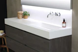 Modern bathroom setting featuring the magnetic water device integrated seamlessly near the sink.