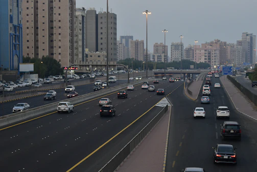 Fleet vehicles equipped with IoT sensors on a highway