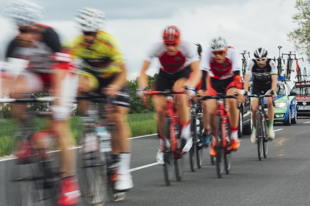 men riding on road bikes