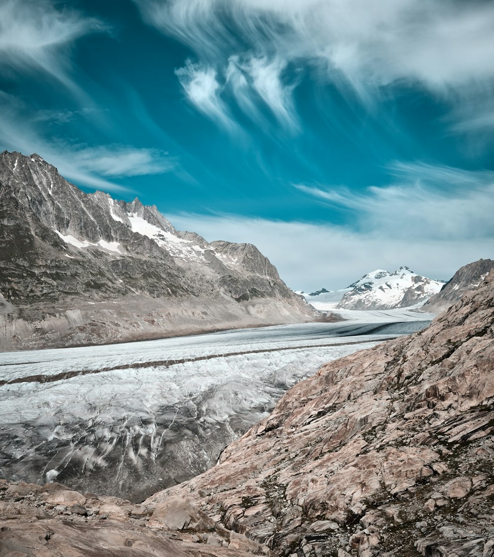 snow covered mountain under blue sky during daytime