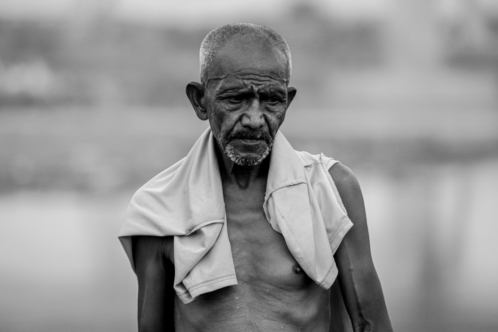 grayscale photo of man in button up shirt