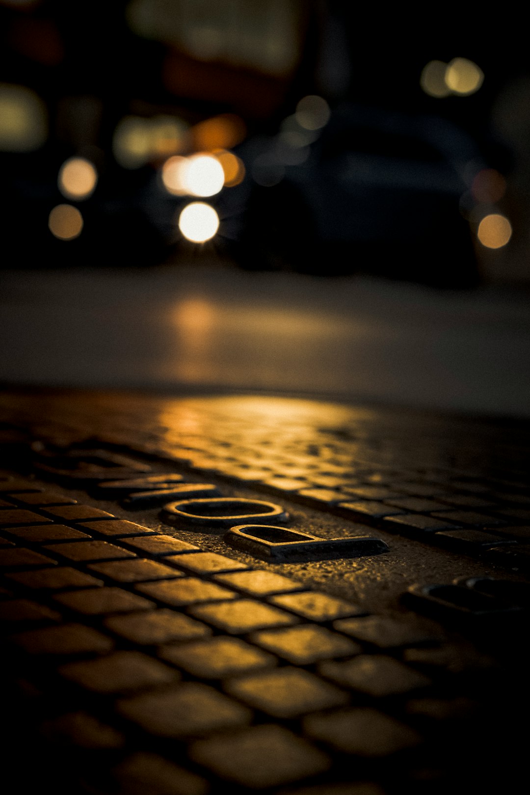 bokeh photography of black and white road