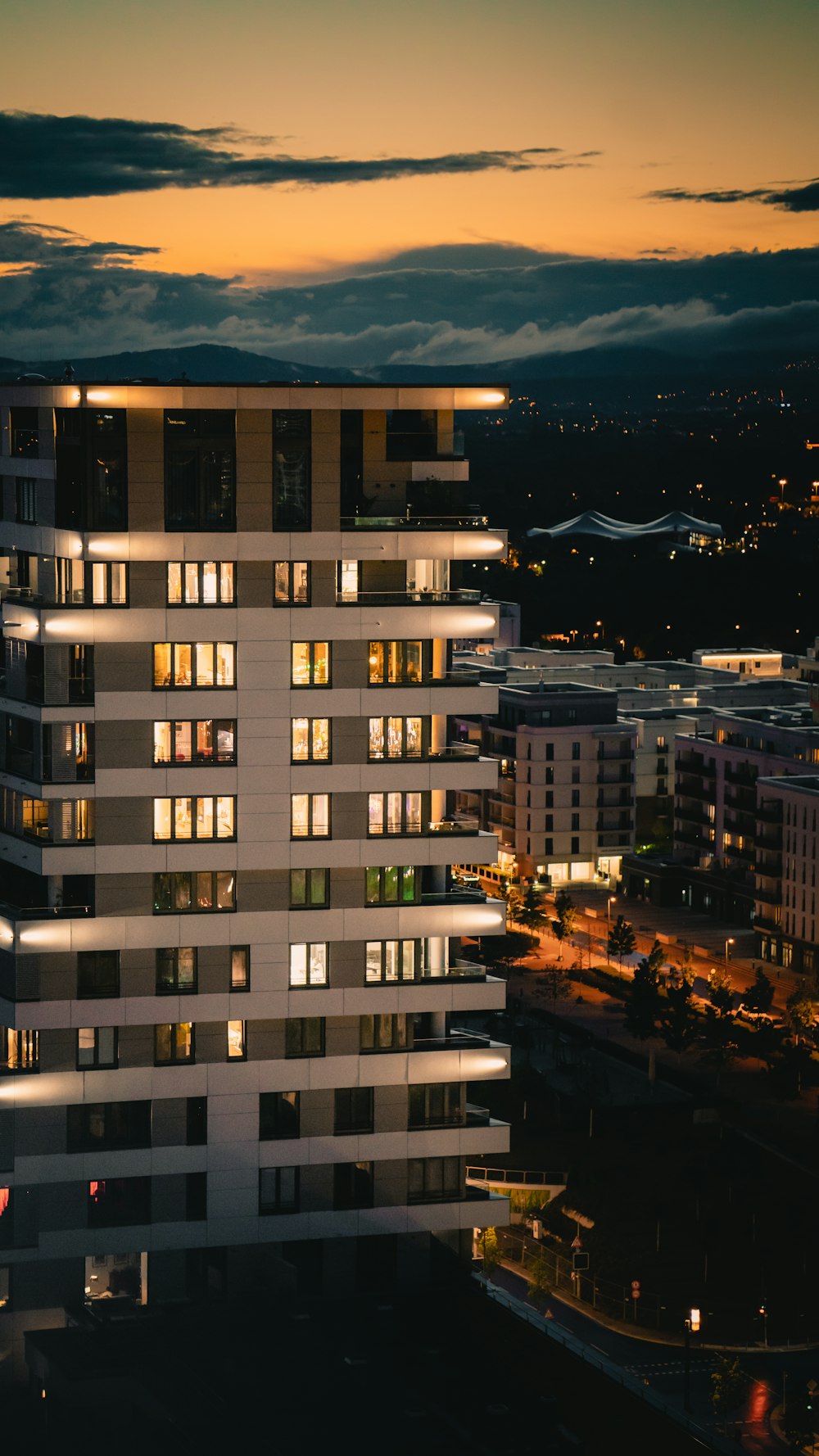 white and brown concrete building during night time