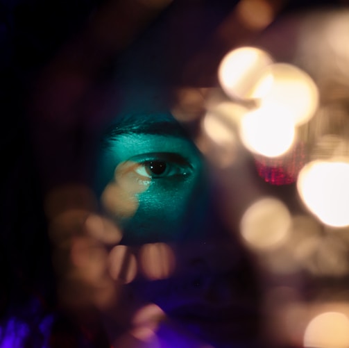 woman with blue and green face paint