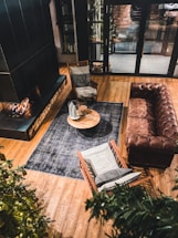 A cozy UK living room showcasing a stylish floor covering from ropemat media.