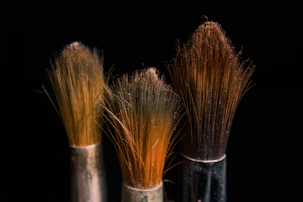 brown and black makeup brush