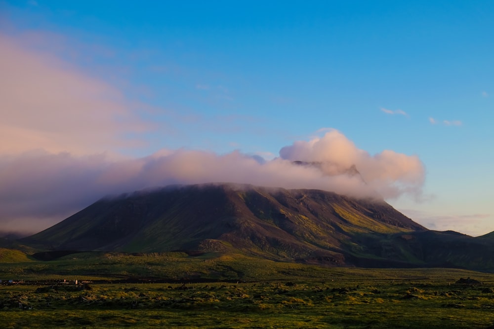 green and brown mountain under blue sky during daytime