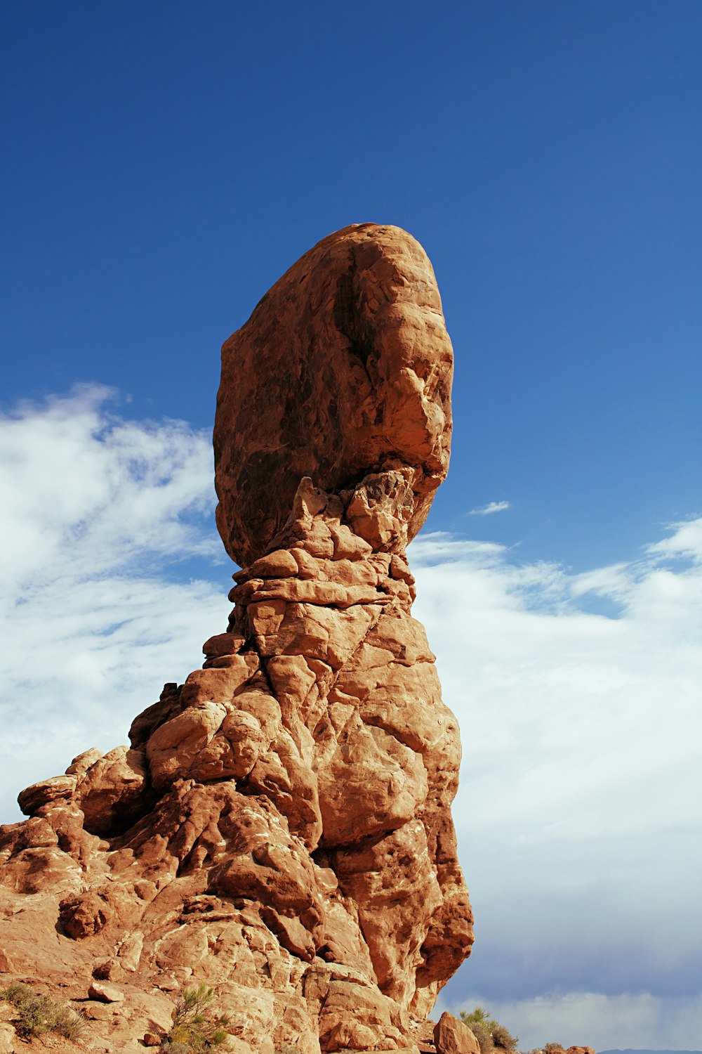 brown rock formation under blue sky during daytime