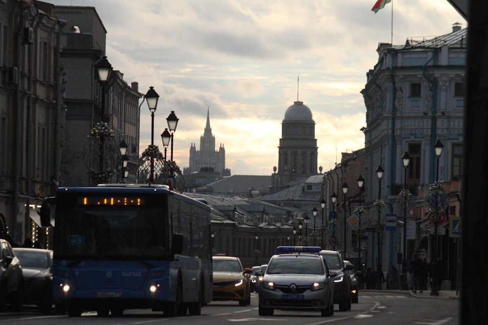 cars on road near buildings during daytime