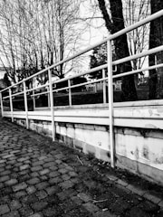 Photo showing clean, newly paved outdoor walkway with stone pavers.