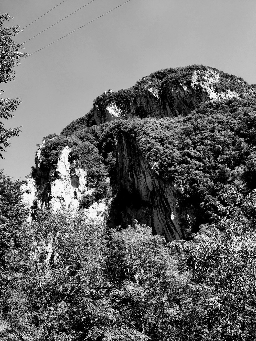 grayscale photo of rocky mountain