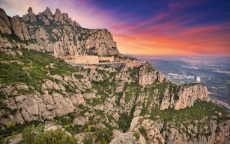 white building on top of mountain